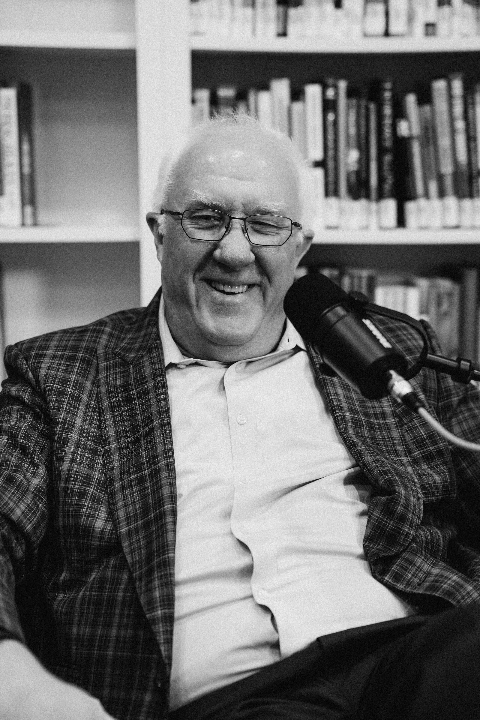 Darin Sargent laughing during a podcast interview