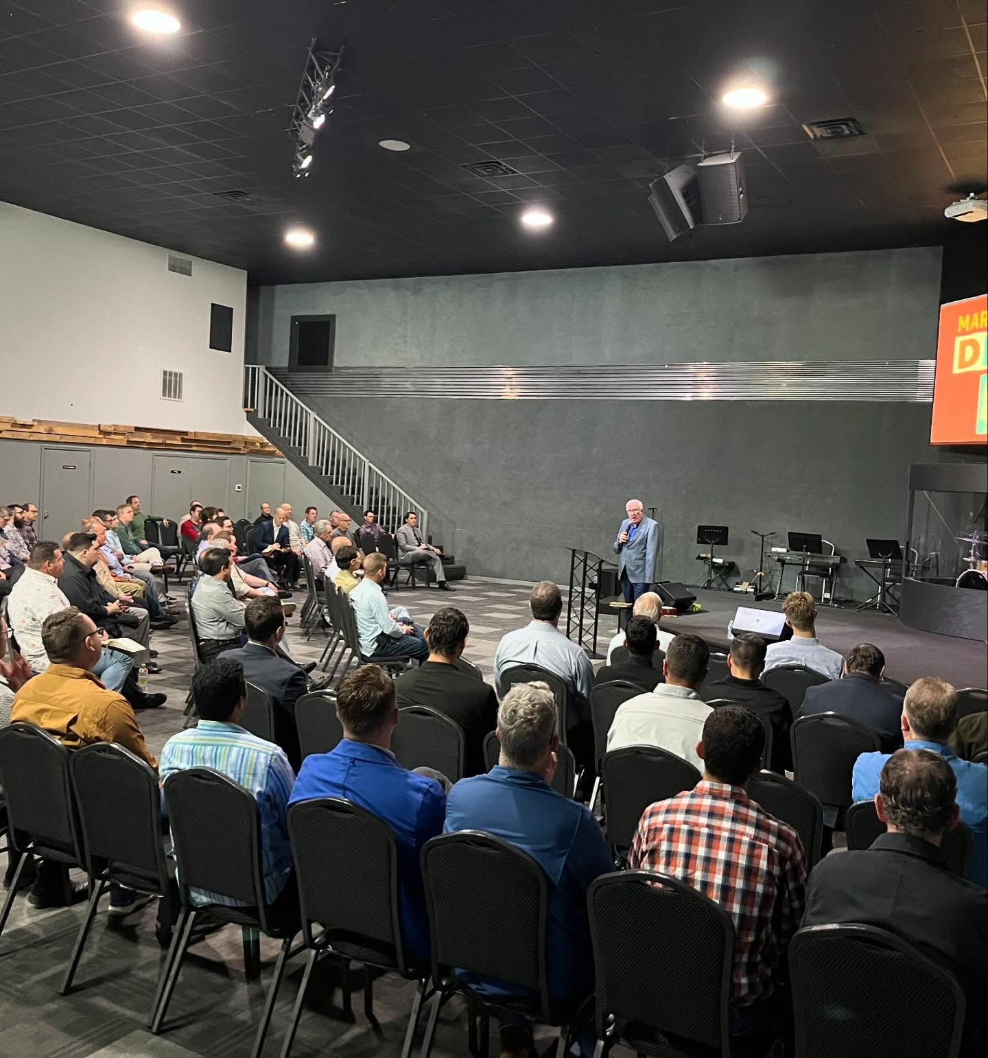 Darin Sargent leading a room full of leaders