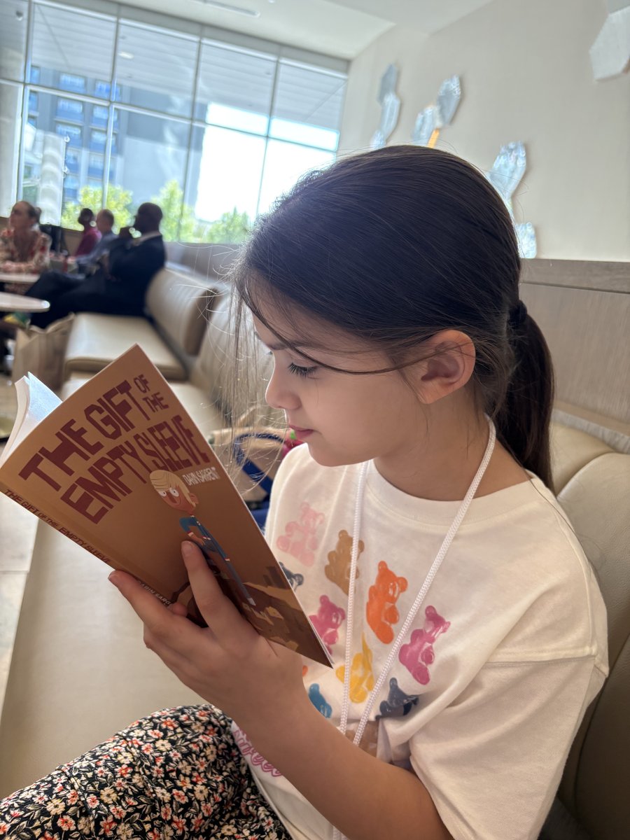 Girl reading The Gift of the Empty Sleeve